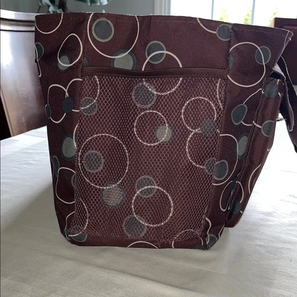 All purpose Brown Polka Dot Vinyl Tote Bag Open at top with side pockets.